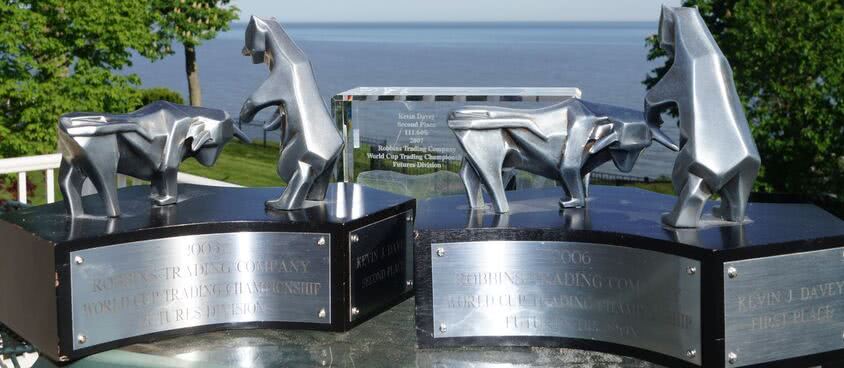 A series of first place trophies awarded for outstanding trading systems performance